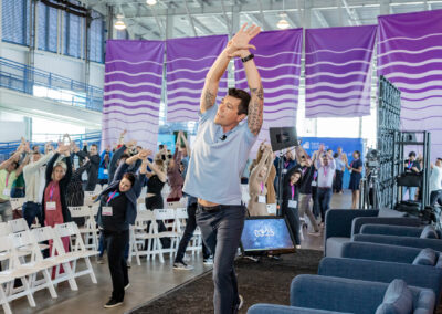 Hint health conference event group stand up and stretch ergonomic break